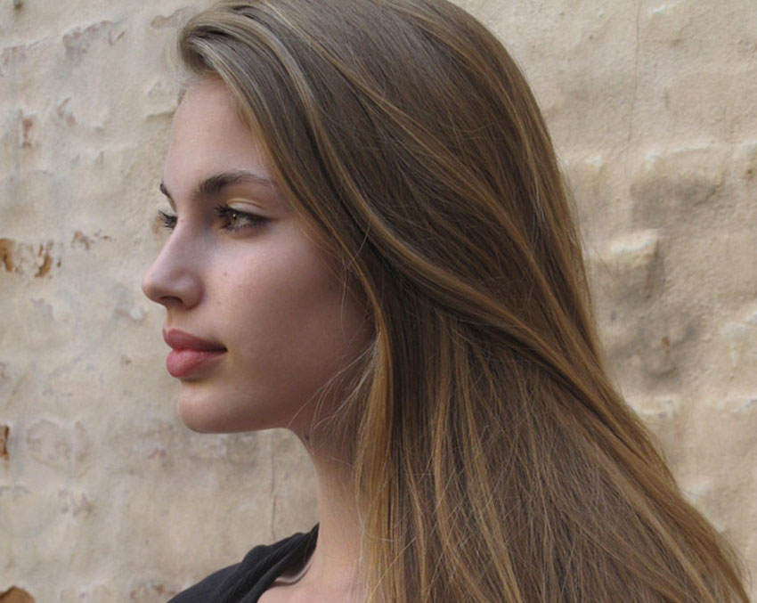 Woman with brown hair.